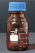 Frasco ambar, 50 ml, graduado, tapa a rosca azul. Normax